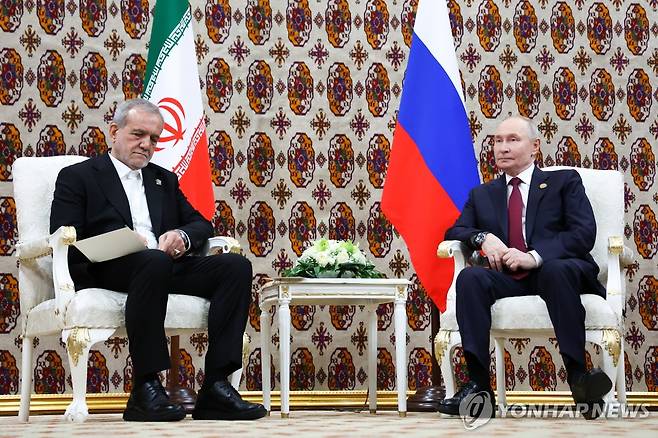 페제시키안 이란 대통령과 푸틴 러시아 대통령 [타스 연합뉴스 자료사진. 재배포 및 DB 금지]