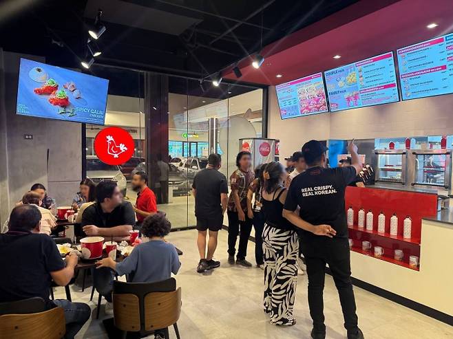 BQ는 온두라스 제2 도시 산페드로술라 남동부 복합 상업시설 타운센터에 'BBQ 타운센터점'을 오픈했다./사진=제너시스BBQ