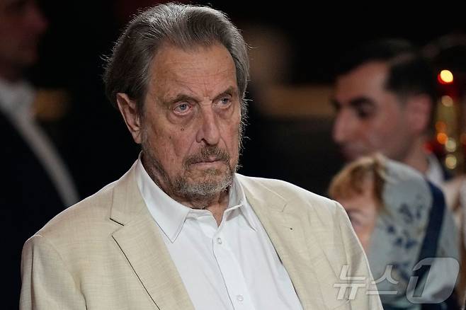 남아프리카공화국 사업가이자 일론 머스크의 아버지인 에롤 머스크가 12일(현지시간) 모스크바에서 열린 정교회 부활절 예배에 참석하고 있다. 2026.04.12. ⓒ AFP=뉴스1