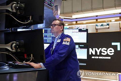 뉴욕증권거래소의 트레이더 [AFP 연합뉴스 자료사진. 재판매 및 DB 금지]