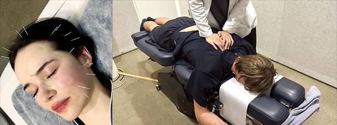 지난 23일 서울 성수동 두나한의원을 찾은 외국인 환자들이 안면비대칭 교정을 위한 침치료(왼쪽)와 체형을 교정하는 추나치료를 받고 있다.    /두나한의원 제공