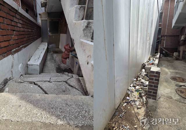 안양시 만안구 안양동의 한 오피스텔 신축 공사로 발생한 진동 때문에 부서진 주택가 계단과 담장. 윤준호기자