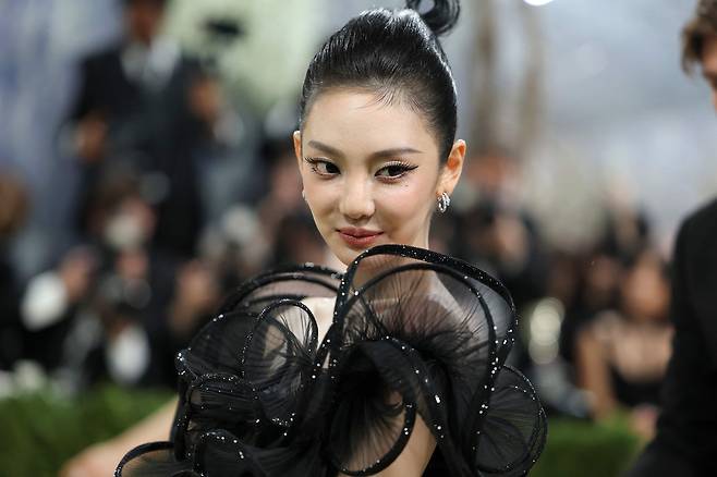 aespa's Ningning poses for photos at the 2026 Met Gala celebrating ″Costume Art″ at the Metropolitan Museum of Art in New York on May 4. [AFP/YONHAP]