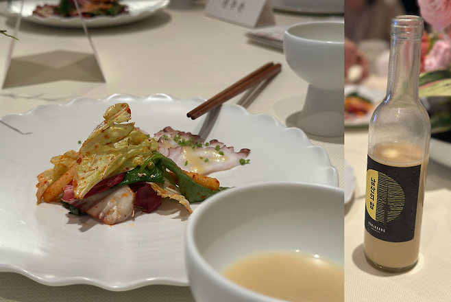 Parboiled octopus with vegetables in mustard sauce (left) paired with Yunjudang's Namsan Night. (Tammy Park/The Korea Herald)