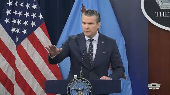 U.S. Secretary of Defense Pete Hegseth speaks during a Pentagon press briefing on March 13. [SCREEN CAPTURE]