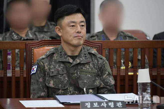 [서울=뉴시스] 국회사진기자단 = 12·3 비상계엄 당시 부정선거 의혹 수사를 위한 제2수사단을 구성하기 위해 정보사 명단을 유출했다는 혐의를 받는 문상호 전 정보사령관 등에게 특별검사팀이 징역 5년을 구형했다. 사진은 문 전 사령관. 2026.05.15. photo@newsis.com