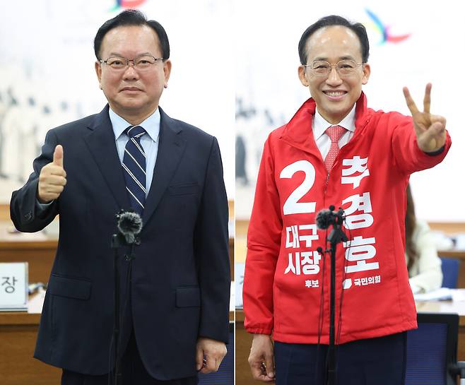 대구시장 자리를 놓고 맞붙은 더불어민주당 김부겸 후보(왼쪽)와 국민의힘 추경호 후보가 2026년 5월14일 대구시선거관리위원회에서 후보 등록을 한 뒤 각자 포즈를 취하고 있다. 연합뉴스