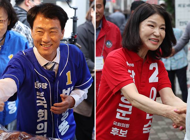 ▲ 더불어민주당 박형룡 달성군 국회의원 보궐선거 후보(왼쪽)와 국민의힘 이진숙 달성군 국회의원 보궐선거 후보가 21일 대구 달성군 화원시장을 찾아 시민들에게 인사하고 있다. 연합뉴스