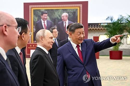 베이징에서 만난 푸틴과 시진핑 [AFP 연합뉴스 자료사진 제공]