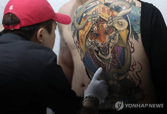 문신 [연합뉴스 자료사진]