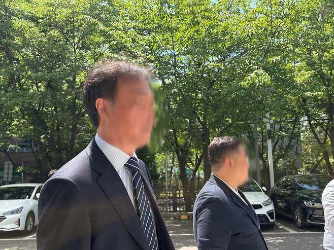 ▲ 영장실질심사 출석하는 알에프세미 대표 반 모 씨 [연합뉴스]