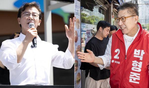 더불어민주당 전재수 부산시장 후보가 25일 중구 자갈치 시장 앞에서 유세 하고 있다. 전민철 기자(왼쪽), 국민의힘 박형준 부산시장 후보가 25일 부산 남구 못골시장을 방문해 시민과 인사를 나누고 있다. 이원준 기자