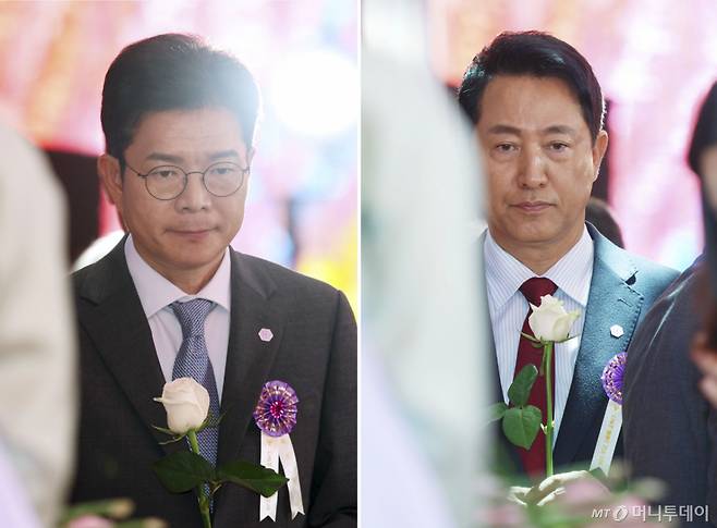 [서울=뉴시스] 최동준 기자 = 정원오(왼쪽) 더불어민주당 서울시장 후보와 오세훈 국민의힘 서울시장 후보가 24일 서울 종로구 조계사에서 열린 불기 2570년 부처님오신날 봉축법요식에서 헌화하고 있다. (청와대통신사진기자단) 2026.05.24. photocdj@newsis.com /사진=고승민