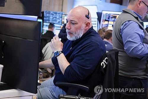뉴욕증권거래소의 트레이더 [AFP=연합뉴스 자료사진. 재판매 및 DB 금지]