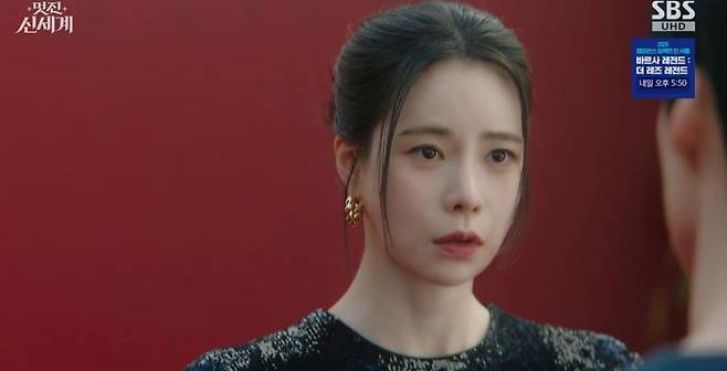 In Brave New World, Heo Nam-joon and Im Ji-yeon shared a passionate kiss amid a crisis, confirming their true feelings for one another.In the ninth episode of the SBS Friday-Saturday drama Brave New World, which aired on the 5th, Cha Se-gye (played by Heo Nam-joon) and Shin Seo-ri (played by Im Ji-yeon) were shown struggling with the revelation of their past lives.At the launch party for the brand B.O.J., Cha Se-gye suddenly asked Shin Seo-ri, Who are you? Gangga Dansim. Who are you? catching her off guard. He then poured out his confusion, saying, A certain woman keeps appearing in my dreams. A palace maid with no friends and no family. At first, I thought it was just a dream. But its strange. That woman looks exactly like you. Am I going crazy?In response, Shin Seo-ri retorted, Who are you to ask me that out of the blue? Did you have a drink in the middle of the day? She added, You cant even tell the difference between a crazy dream and reality. Seeing you show up looking like that and rambling about dreams, youve clearly lost your mind, trying to sound calm while inwardly feeling deeply unsettled.The two kept replaying their conversation over and over in their heads even inside the party hall. Just then, Cha Se-gyes fiancée, Mo Tae-hee (played by Chae Seo-an), appeared and asserted her claim, saying, What are you doing, Se-gye? In an official setting, Im the one who— Shin Seo-ri calmly retorted, Right, youre his fiancée. Ill give you permission, so go hold his hand and take a lap.When Cha Dal-su (played by Yoon Joo-sang), Cha Se-gyes grandfather and the chairman, appeared shortly after, Shin Seo-ri pulled out all the stops with her charm, calling him Grandpa and engaging in a battle of wits with his fiancée, Mo Tae-hee. Cha Se-gye tried to stop them by saying, Enough already, which drew laughter from everyone. Shin Seo-ri retorted, You used to nag me to call you CEO at first, so is being so sensitive about titles like an old fogey a family trait?Later, while reviewing the script for the drama *Queen of Women 2*, in which Shin Seo-ri stars, Cha Se-gye discovered a scene depicting Joo-sang and the noblewomans consummation and flew into a rage. He threw the script down and ordered, Director Son, contact the advertising team. Now, and, leveraging his massive product placement budget, had the entire scene replaced with a silk-rearing ceremony scene that included indirect advertising for cosmetics.Cha Se-gye even visited the set in person and warned the male lead (played by Ahn Chang-hwan), Im the one whos poured a lot of money into this drama, so I have a question. Are you sure the intimate scene with Shin Seo-ri has been cut? He added, There wont be any intimate scenes from now on. So please refrain from any unnecessary physical contact. When the co-star asked who she was, she caused an uproar with the absurd reply, Me? Shin Seo-ris stalker.When Shin Seo-ri, seeing this, scolded him, What am I supposed to do if you keep barging in like this without warning? Cha Se-gye explained, I think Im so stressed from worrying about every little thing that Im even having dreams about it. I need to live more comfortably, explaining that he had changed the script to protect the actress from the troublemaker. When Shin Seo-ri thanked him, saying, Thanks to you, I nailed that scene, Cha Se-gye retorted, Just words? He then snatched the eye-shaped candy Shin Seo-ri had pulled out, popped it into his mouth, and smiled, remarking, Its disgustingly sweet.Later, Cha Se-gye underwent surgery to have his impacted wisdom tooth extracted. Under anesthesia on the operating table, he had a dream about the past once again. In the dream, Lee Hyun, longing for Gang Dan-sim, wrote a poem and muttered, I just cant bring myself to tell her this. When Cha Se-gye woke up from the anesthesia and didnt see Shin Seo-ri by his side, he was disappointed, calling her a heartless woman, but soon spotted Shin Seo-ri, who had walked through the rain with bare hands to buy ice for him, and his face lit up with relief.Shin Seo-ri, troubled by the dream Cha Se-gye had mentioned, asked him about its contents, and he replied, He called me Grand Prince. Realizing that the Grand Prince Lee Hyun from her past was actually Cha Se-gye, Shin Seo-ri despaired, thinking, A bad feeling is never wrong. Contrary to her expectation that Grand Prince Lee Hyun would have resented her, Cha Se-gye sincerely told her, He was in love with a woman named Gang Dan-sim, making Shin Seo-ris heart skip a beat.Cha Se-gye dropped a bombshell, saying, Ill take care of Grandfather and settle the political marriage myself. When Shin Seo-ri sarcastically retorted, Are you giving up already? Why not milk it for all its worth? You seem really scared of Grandpas reaction, to which she bluntly confessed, Hes just doing that to look good in your eyes.Before heading home, Shin Seo-ri warned, Be careful of Choi Moon-do (played by Jang Seung-jo). Dont trust anyone, she warned. When Cha Se-gye brushed it off, saying, Ill handle it myself, she offered concerned advice: Do you think the world is that easy? You dont know when or where a knife might strike—do you really want to play at love so carefree? Cha Se-gye retorted, The world is easy for me. But youre the one whos hard. Just dont show up in my dreams, to which Shin Seo-ri asked, What if its not a dream? What if Im that kind of woman? A woman who would give up anything to survive? leaving Cha Se-gye unsettled.Shin Seo-ri visited the history museum and fell deep in thought while looking at the painting she had created. Just then, a student preparing a thesis approached her and showed her a painting in the museum that resembled Shin Seo-ri. This painting depicted a heart-wrenching love letter that Prince Lee Hyun had once left for Gang Dan-sim. Shin Seo-ri wept, saying, Unable to even deliver it, agonizing like a stone, my heart rotting away. What kind of love is that? Love my ass. Then, as if she had made up her mind, she sprinted off at full speed. Unlike her past self, who had foolishly let Lee Hyun slip away, she resolved to charge headlong toward Cha Se-gye in this life.Toward the end of the episode, when Choi Moon-dos hidden camera was discovered, he threatened Cha Se-gye by pulling out a photo of Shin Seo-ri. Cha Se-gye went to find Shin Seo-ri and lashed out at her, asking, Why didnt you tell me you met Choi Moon-do? But in the end, she kissed her, saying, No matter who you are or where you came from, I believe you completely, so forget about all the other guys and just look at me.