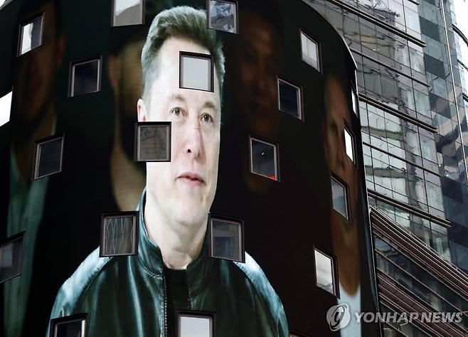 타임스스퀘어 전광판 속 일론 머스크 [UPI=연합뉴스. 재판매 및 DB 금지]