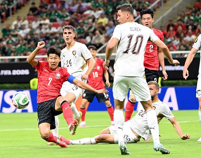 Korean footballer Son Heung-min, left bottom, strikes a ball at a FIFA World Cup 2026 match held in Mexico on June 11. KANG JUNG-HYUN