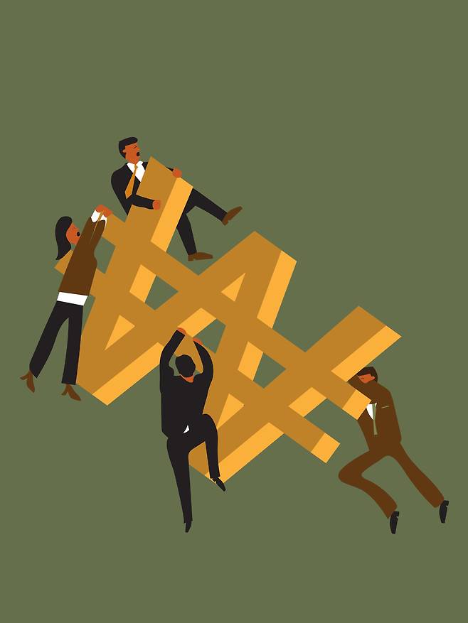 Financial workers try to keep the won symbol from falling. GETTY IMAGES PRO