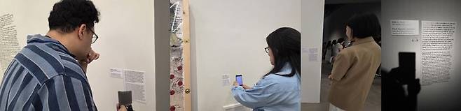 [사진=박현주 미술전문기자] 국립현대미술관 서울관 '이것은 개념미술이 (아니)다' 전시장. 작품 앞에 선 관람객들이 이미지를 보기보다 제목과 설명문을 읽으며 작품의 의미를 따라가고 있다. 2026.06.18. hyun@newsis.com *재판매 및 DB 금지