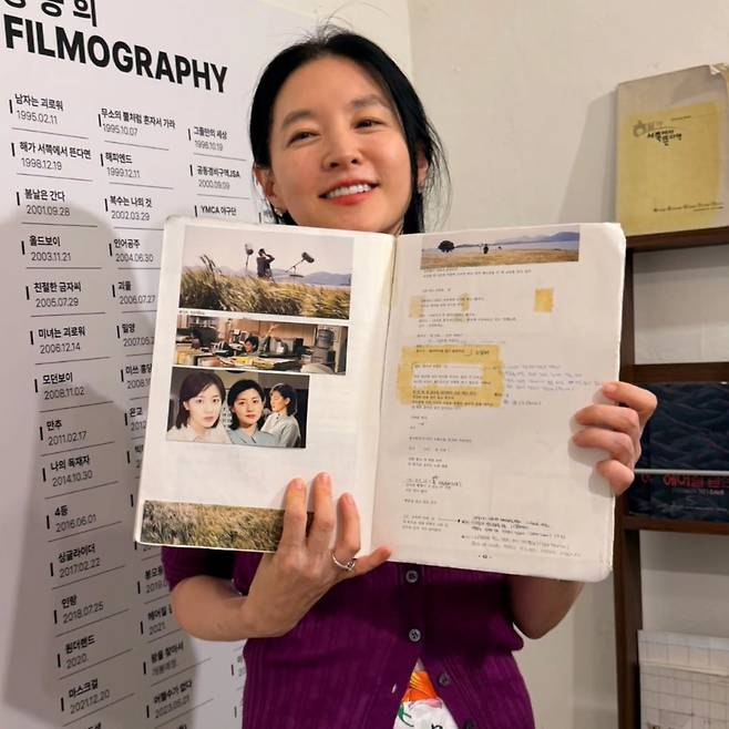 Actress Lee Yeong-ae visited the exhibition celebrating the 30th anniversary of film makeup director Song Jong-hee to offer her congratulations. Holding the script for the film *One Fine Spring Day*, in which she previously starred, Lee Yeong-ae smiled brightly, showcasing her unchanging innocent charm.On the 22nd, Lee Yeong-ae shared photos of her visit to the exhibition on her social media account, along with a message sincerely congratulating Director Song on her 30th anniversary. In the photos, Lee Yeong-ae and Director Song shared a warm embrace, commemorating their long-standing relationship.In particular, Lee Yeong-ae demonstrated her deep affection for the film by personally holding the script for *One Fine Spring Day*, which was released in 2001, while posing for the photo. Her timeless beauty drew admiration from many.Lee Yeong-ae and Director Song Jong-hee have maintained a deep bond, having worked together on numerous projects including the films *One Fine Spring Day* and *Sympathy for Lady Vengeance*. This visit to the exhibition is drawing attention as a move that showed warm loyalty by sharing a colleagues special moment.