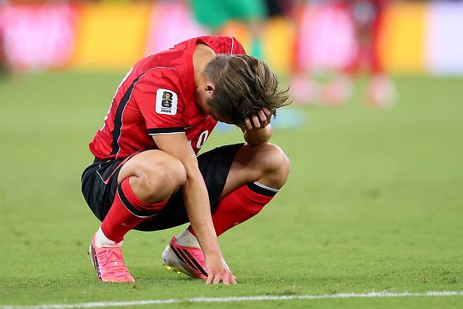 Lee Kang-in reacts after South Korea's match against South Africa on Wednesday. (Reuters-Yonhap)