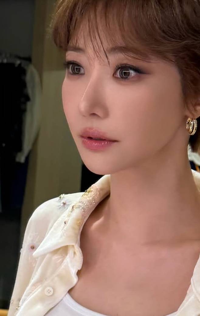 Actress Go Joon-hee showcased her unrivaled fashion sense by posting photos of herself wearing various outfits on her social media. She captivated attention with her mannequin-like figure and doll-like beauty.In the released photos, Go Joon-hee exuded a chic charm while wearing a black mini-dress that revealed her flawless legs. She also perfectly pulled off a diverse range of styles, from an office look combining a shirt and slacks to a casual look matching a jacket with denim shorts.Her distinct facial features stood out in the side profile photos, drawing admiration from netizens. Meanwhile, Go Joon-hee is currently actively communicating with fans through her personal YouTube channel, Go Joon-heeGO.