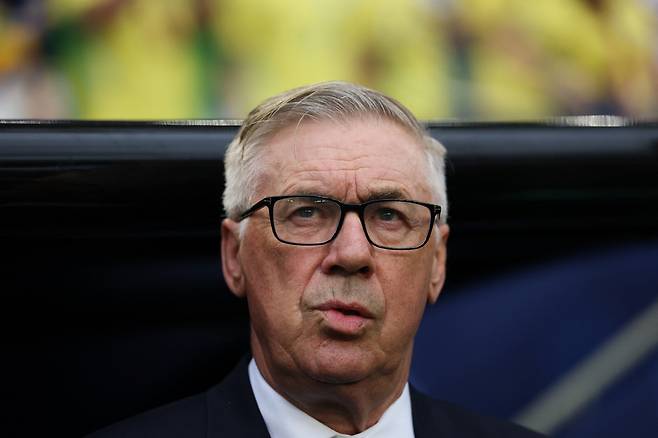 Brazil's Italian head coach Carlo Ancelotti gestures ahead of the 2026 World Cup Group C football match between Scotland and Brazil at the Miami Stadium in Miami Gardens on June 24, 2026.  (Photo by PATRICIA DE MELO MOREIRA / AFP)  <저작권자(c) 연합뉴스, 무단 전재-재배포, AI 학습 및 활용 금지>