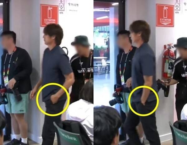 홍명보 한국 축구대표팀 감독이 사퇴 입장문을 발표한 뒤  감독이 손을 주머니에 넣은 채 회견장을 빠져나가는 모습. 유튜브 채널 ‘KBS News’ 영상 캡처