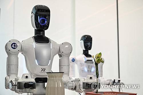 엑스스퀘어의 가사노동 훈련 현장 [AFP=연합뉴스 자료사진]