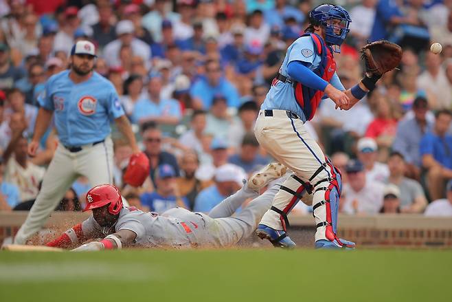 <yonhap photo-4389=""> St. Louis Cardinals' Jordan Walker, bottom left, slides into home plate to score on a two-RBI single by Alec Burleson during the fourth inning of a baseball game against the Chicago Cubs, Friday, July 3, 2026, in Chicago. (AP Photo/Melissa Tamez)/2026-07-04 08:07:10/ <저작권자 ⓒ 1980~2026 ㈜연합뉴스. 무단 전재 재배포 금지, AI 학습 및 활용 금지></yonhap>