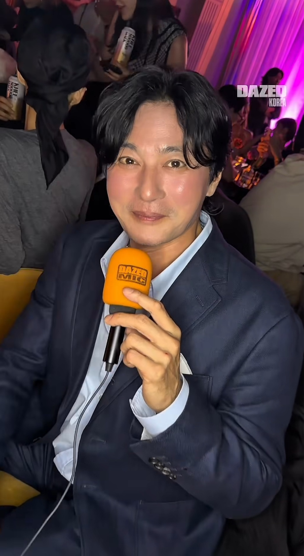 Actor Jang Dong-gun attended a launch event for a liquor brand alongside his wife, Ko So-young, and appeared softer and younger than before. In a video released by Dazed Korea, Jang Dong-gun appeared wearing a navy suit and sporting a bright expression, capturing the publics attention.In the video, Jang Dong-gun displayed a noticeably more youthful appearance, with a healthy glow and fuller cheeks. Netizens who saw the footage reacted positively to his changed vibe, praising his youthful looks.Jang Dong-gun is set to star in Tropical Night, his next project following last years film An Ordinary Family. He married Ko So-young in 2010, and the couple has a son and a daughter.