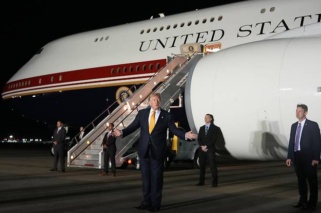 President Donald Trump switches planes at U.S. Air Force Base, RAF Mildenhall in Suffolk Eastern England, on his way back to Washington from the NATO summit in Ankara, Turkey, Wednesday, July 8, 2026. (AP Photo/Alex Brandon)