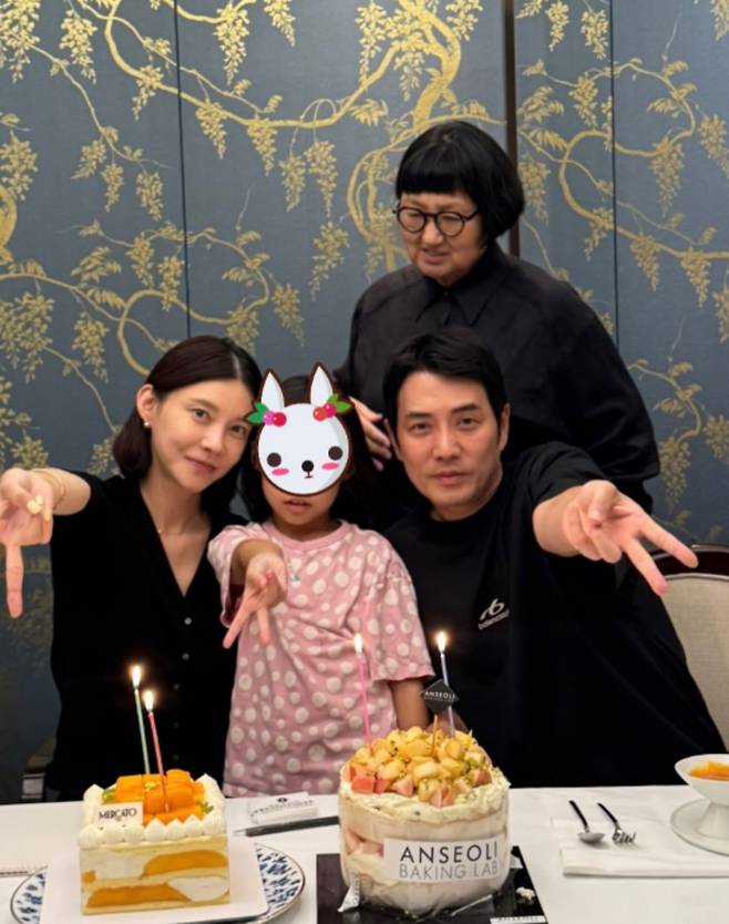 Actress Cha Ye-ryun celebrated her husband Ju Sang Wooks birthday on her personal social media and shared glimpses of their happy family life. In the photos released, Ju Sang Wook is seen enjoying a happy time receiving a kiss on the cheek from his daughter, exuding a harmonious atmosphere while showcasing their affectionate marital bond with Cha Ye-ryun.Cha Ye-ryun left an affectionate message for her husband, revealing their unchanging relationship. The couple married in 2017 and have a daughter, In-ah.Ju Sang Wook is currently delivering an intense performance as the villain Ju Kang-chan, the chairman of a construction company, in the SBS Friday-Saturday drama Manager Kim.