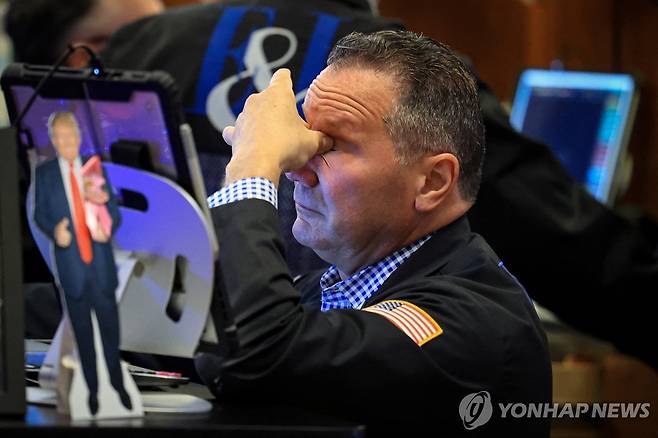 23일(현지시간) 미국 뉴욕증권거래소(NYSE) 트레이더 [로이터=연합뉴스]