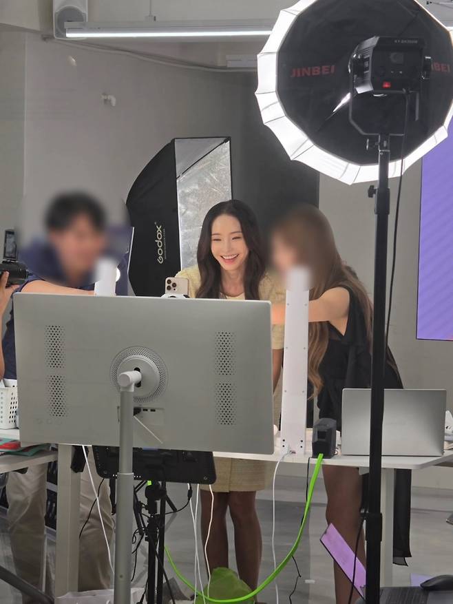 Actress Han Chae-young showcased her unchanging, Barbie Doll-like beauty by sharing everyday photos taken while waiting for filming. Han Chae-young flaunted her radiant visuals by posting behind-the-scenes photos on her social media account.In the released photos, Han Chae-young is wearing a light yellow tweed dress and smiling brightly. Despite being on standby before filming, she captivated viewers with an atmosphere reminiscent of a scene from a movie.Her natural interactions with the staff on set also drew attention. Born in 1980, Han Chae-young drew admiration from fans by displaying both her enduring innocence and sophisticated charm.