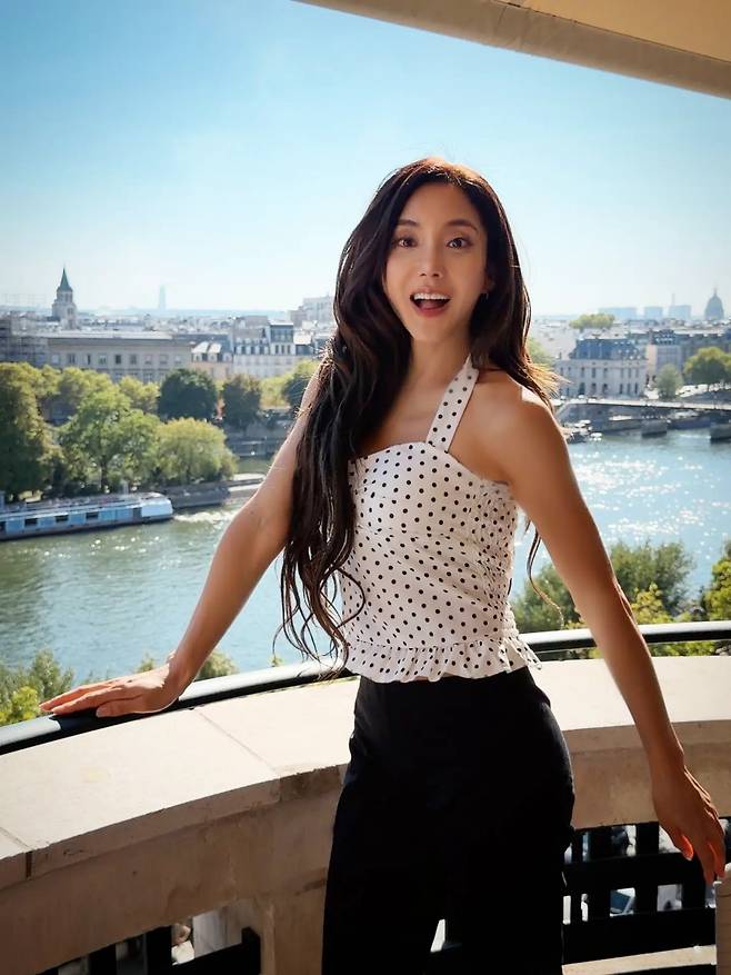 Singer Sea showed off her unchanging baby face visuals by releasing recent photos taken in Paris, France. Sharing glimpses of her daily life in Paris on her social media, Sea captivated attention with her ageless beauty and toned physique.In the released photos, Sea strikes alluring poses on a terrace overlooking the Parisian cityscape, showcasing a fashion style that exudes a strong summer vibe. In particular, her baby face, which makes it hard to believe she is 46 years old, and her lean figure drew admiration from many.Netizens who saw Seas post responded enthusiastically, praising her visuals that perfectly complemented the Parisian scenery. Sea debuted in 1997 as a member of the group S.E.S and has continued her active career to this day.