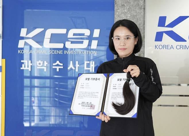 이현주 경사의 세 번째 모발 기부/사진=충북경찰청 제공