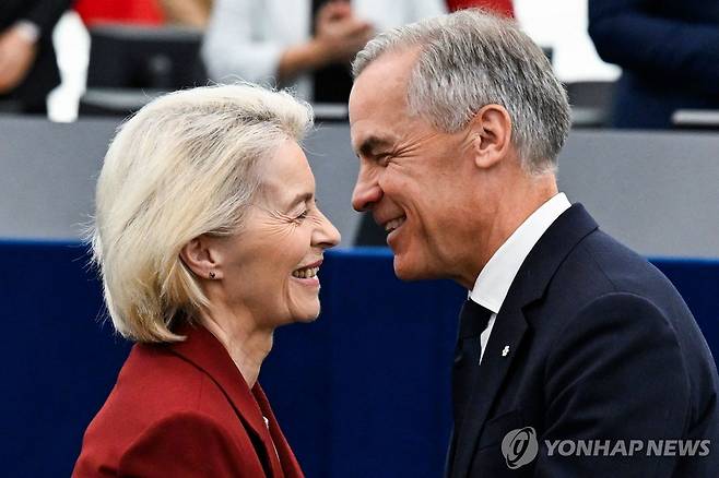 캐나다 총리와 EU 집행위원장(왼쪽) [AFP=연합뉴스. 재판매 및 DB 금지]