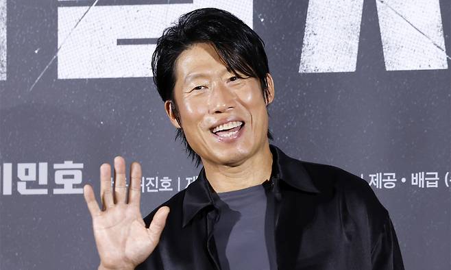 배우 유해진이 지난 8월10일 오전 서울 용산구 CGV용산아이파크몰에서 열린 영화 ‘암살자(들)’ 제작보고회에서 포즈를 취하고 있다. 뉴시스