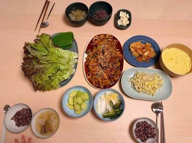 Actress Son Ye-jin has become a hot topic after revealing the heartfelt meals she prepared for her family.On the 21st, Son Ye-jin posted several photos on her social media account along with the caption, I am happiest when we all sit down and eat together after frantically cooking. I hope you all eat healthy and delicious food.The photos show various meals that Son Ye-jin prepared for her husband, Hyun Bin, and their son, Woo-jin. Son Ye-jin showed off her skills as a master homemaker with meals filled with care, featuring not only a perfect menu composition but also neat plating. Some photos even captured Woo-jins small hands, bringing smiles to viewers faces.Netizens who saw this commented, It is so neat and clean. It feels like the plating of a traditional Korean restaurant, You can tell she is skilled just by looking at it. She really made the right choice marrying Hyun Bin, and She is beautiful and good at cooking too; Son Ye-jin is a cheat code.Son Ye-jin married fellow actor Hyun Bin in 2022 and welcomed their son, Woo-jin, into her arms that same year. Previously, Son Ye-jin appeared on JTBCs Please Take Care of My Refrigerator to reveal her cooking skills and stated, My husband likes kimchi stew and steamed eggs. His favorite is sandfish, adding, I eat the food my child leaves behind, and my husband eats the food I leave behind because I am full.
