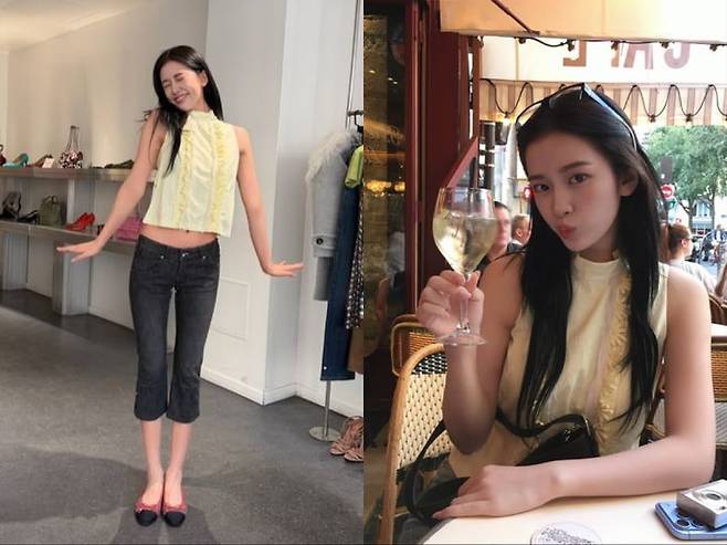 [서울=뉴시스] 아이브 안유진이 프랑스 파리의 한 매장에서 노란색 민소매 상의와 청바지를 입고 늘씬한 몸매와 남다른 비율을 뽐내고 있다. (사진=안유진 인스타그램 캡처)