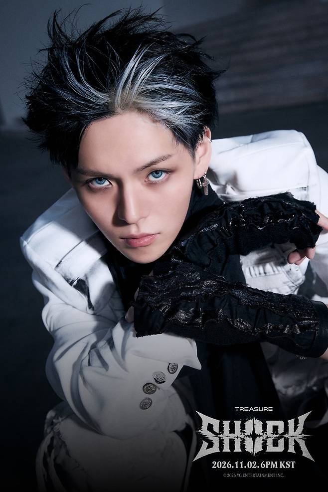 YG Entertainment, the groups agency, posted TREASURE - [SHOCK] VISUAL PHOTO on its official social media channels on the 27th.The members bold style transformations stand out in the released photos. Choi Hyun-suk showed off unrivaled hip-hop swag by mixing and matching a bold buzz cut with unique sunglasses and sporty gloves. Jihoon gazes at the camera with deep eyes and heavy smoky makeup, while Yoshi also catches the eye with his black hair and silver highlights.The audio spoiler, partially unveiled via social media on the 26th, also garnered attention. The lyrics SHOCK SHOCK, which stick in your head intensely, create a perfect harmony with heavy bass and sharp synth sounds, raising expectations.TREASUREs new digital single, SHOCK, will be fully unveiled on November 2 at 6 PM.
