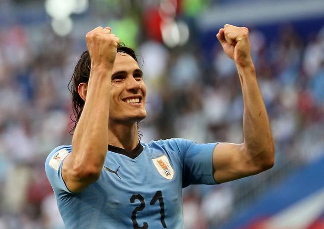 우루과이의 에딘 카바니가 6월 25일 열린 2018 러시아 월드컵 A조 예선전, 개최국 러시아와의 경기에서 3-0으로 승리하고 기뻐하고 있는 모습. ⓒ연합뉴스/EPA