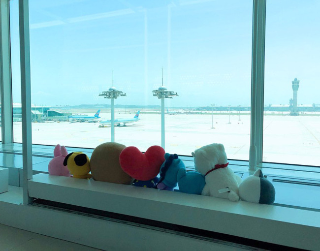 BT21 at the observatory overlooking the runway (The Korea Herald)