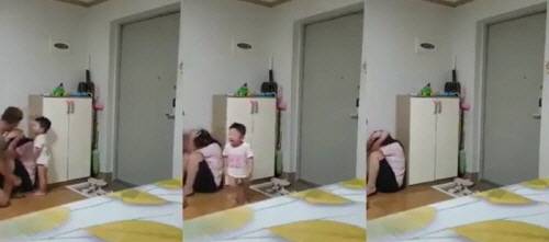 지난 5일 사회관계망서비스(SNS)에 공개된 베트남 이주 여성 폭행 영상의 일부. 이 여성은 남편의 폭력에 아무 저항도 못한 채 비명과 눈물을 흘렸다. 겁에 질린 아이는 “엄마”를 울부짖었다. 사진=커뮤니티 캡처