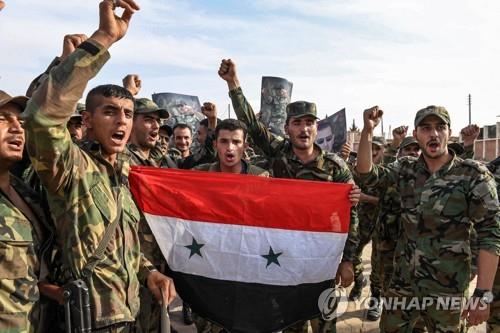 만비즈에 배치된 시리아 정부군 [AFP=연합뉴스]