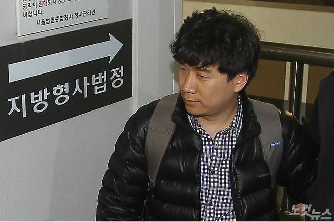 유우성 씨가 지난 2014년 4월 28일 오후 항소심 결심공판을 갖기 위해 서초동 서울고등법원에 들어서고 있다. (사진=자료사진)