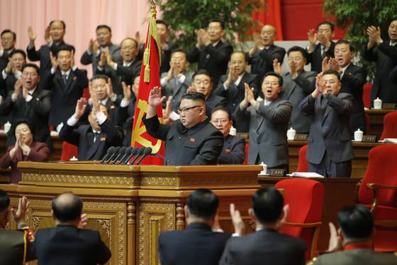 North Korean delegates cheer as General Secretary Kim Jong-un delivers an address to close the 8th Party Congress on Tuesday. The week-long gathering was the second longest congress in the country's history. [NEWS1]