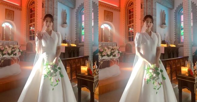 Actor Park Shin-hye has revealed her wearing a wedding dress.Park Shin-hye posted a short-length video on his SNS on the 2nd, along with an article entitled Was it 2:00 in the morning? Was it 3:00.In the video, Park Shin-hye is wearing a white wedding dress and staring at the Camera, making a cute face. Park Shin-hyes elegant charm stands out.Park Shin-hye is appearing on JTBCs Shijips with Cho Seung-woo.