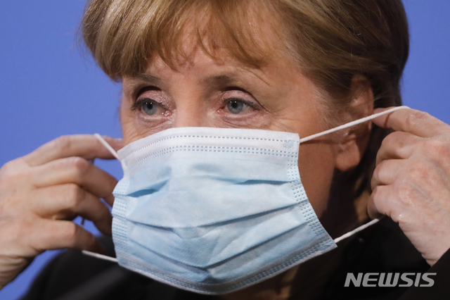 [베를린=AP/뉴시스]마스크를 쓴 앙겔라 메르켈 독일 총리. 2021.03.31.